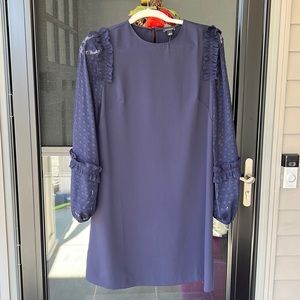 Blue cocktail length long sleeve dress. Never been worn